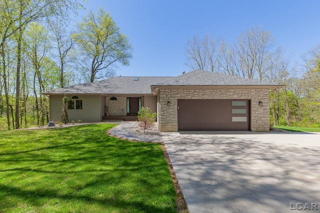 view of front of home featuring a garage, driveway, a front yard, stone siding, and roof with shingles
