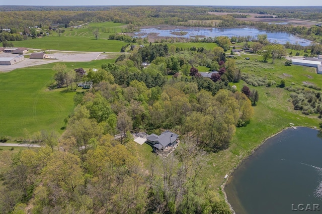 aerial view of property's location with a large body of water