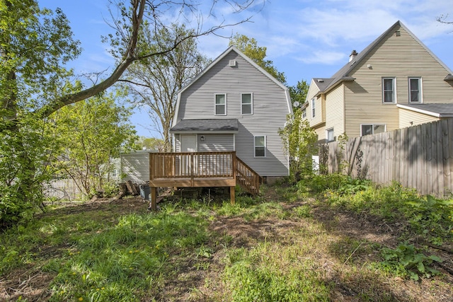 30 Palmer St NW, Grand Rapids, MI 49505 - back of property with a wooden deck and fence