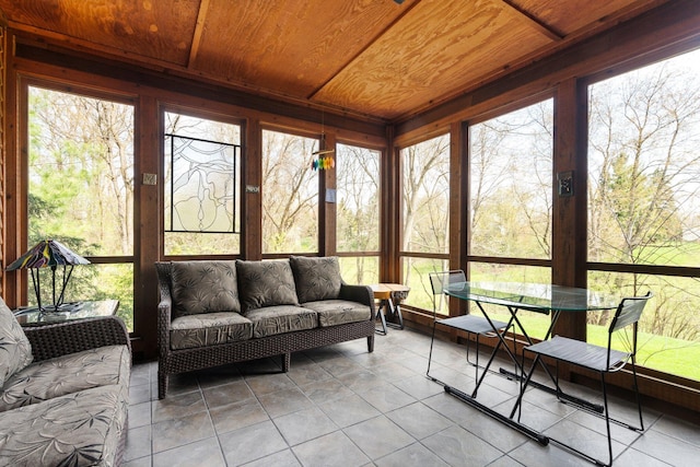 sunroom / solarium with an outdoor hangout area and plenty of natural light