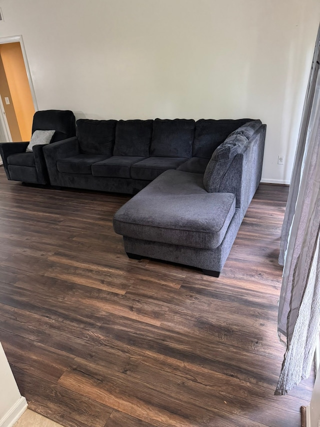 2322 Arcadia Dr, Canton, MI 48188 - living room featuring baseboards and dark wood-style flooring