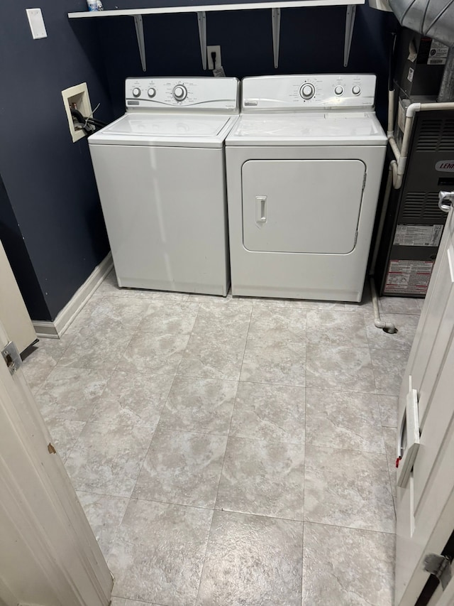 2322 Arcadia Dr, Canton, MI 48188 - laundry room with separate washer and dryer and baseboards