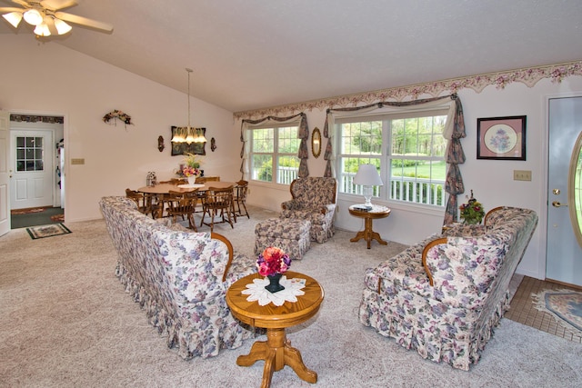 2688 White St, Niles, MI 49120 - living room featuring carpet flooring, a chandelier, lofted ceiling, and a ceiling fan