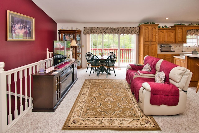 2688 White St, Niles, MI 49120 - living area with light colored carpet, vaulted ceiling, and recessed lighting