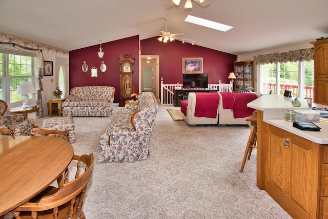 2688 White St, Niles, MI 49120 - living area featuring ceiling fan, light carpet, plenty of natural light, and lofted ceiling