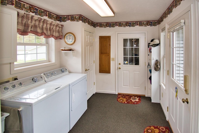 2688 White St, Niles, MI 49120 - laundry room featuring washing machine and dryer, dark carpet, cabinet space, and baseboards