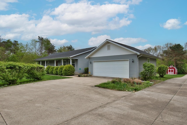 2688 White St, Niles, MI 49120 - ranch-style house featuring a garage and concrete driveway