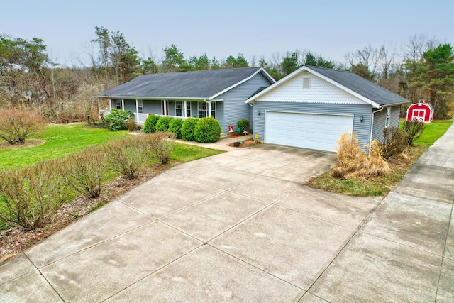 2688 White St, Niles, MI 49120 - single story home featuring a garage, driveway, a front yard, and a porch