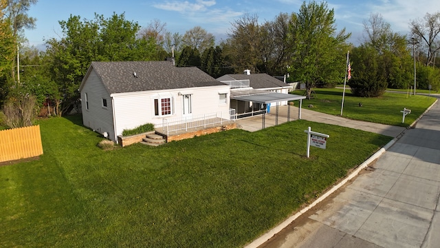 5526 Sylvia St, Dearborn Heights, MI 48125 - view of front of house featuring concrete driveway, a shingled roof, and a chimney