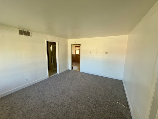 5526 Sylvia St, Dearborn Heights, MI 48125 - carpeted empty room featuring baseboards