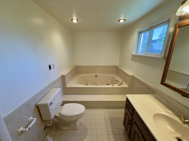 5526 Sylvia St, Dearborn Heights, MI 48125 - full bathroom with toilet, a whirlpool tub, vanity, wainscoting, and tile patterned floors