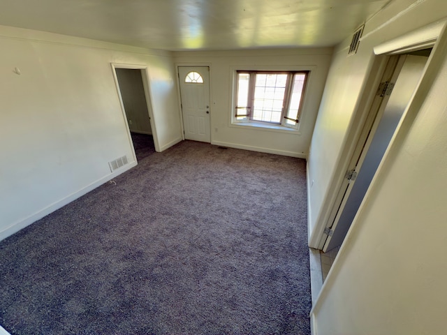 5526 Sylvia St, Dearborn Heights, MI 48125 - carpeted foyer featuring baseboards