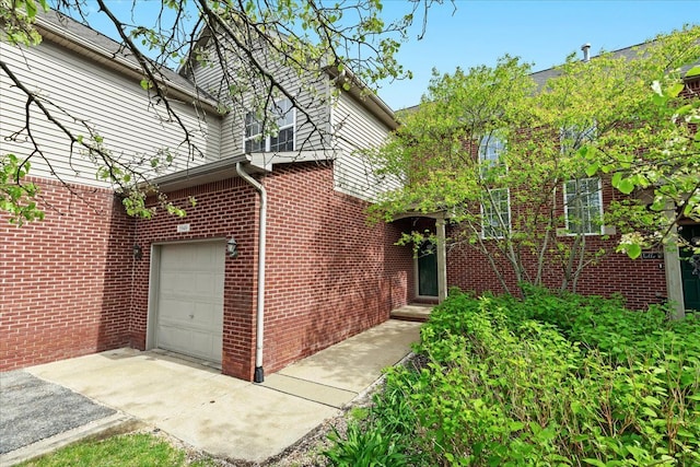5949 High Point Ct, Brighton, MI 48116 - view of front facade with brick siding