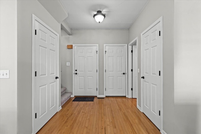 5949 High Point Ct, Brighton, MI 48116 - foyer entrance with light wood-style floors