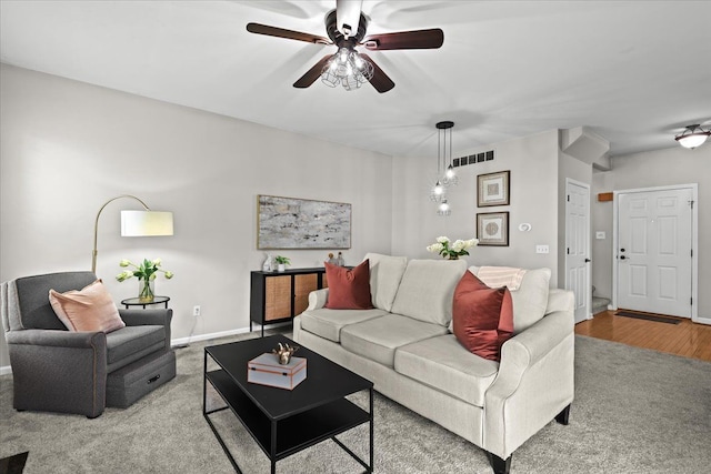 5949 High Point Ct, Brighton, MI 48116 - living room featuring ceiling fan, baseboards, and wood finished floors