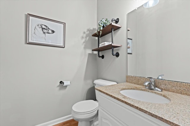 5949 High Point Ct, Brighton, MI 48116 - bathroom with toilet, vanity, and wood finished floors