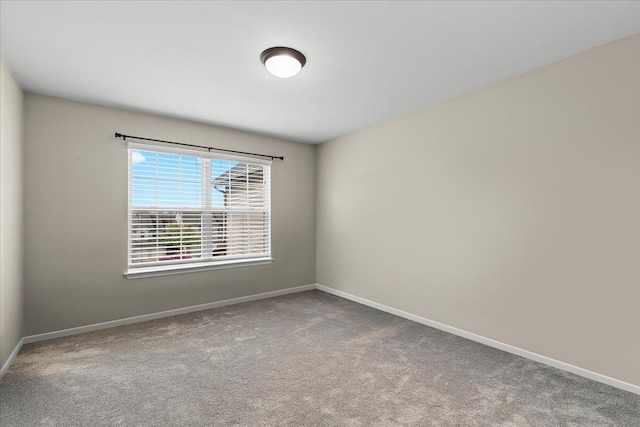 5949 High Point Ct, Brighton, MI 48116 - carpeted empty room featuring baseboards