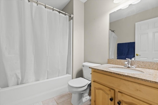 5949 High Point Ct, Brighton, MI 48116 - full bathroom with tile patterned floors, toilet, vanity, and shower / bath combo with shower curtain