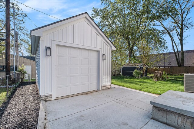3542 Royal Ave, Berkley, MI 48072 - detached garage with central AC unit and driveway