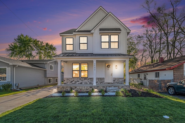 3542 Royal Ave, Berkley, MI 48072 - modern farmhouse style home with a standing seam roof, board and batten siding, covered porch, and metal roof