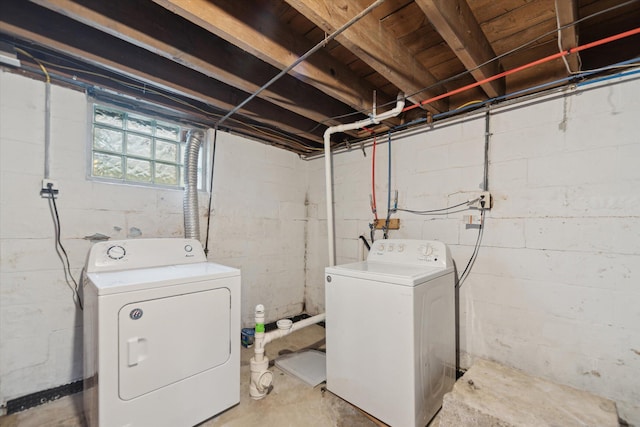 clothes washing area with independent washer and dryer