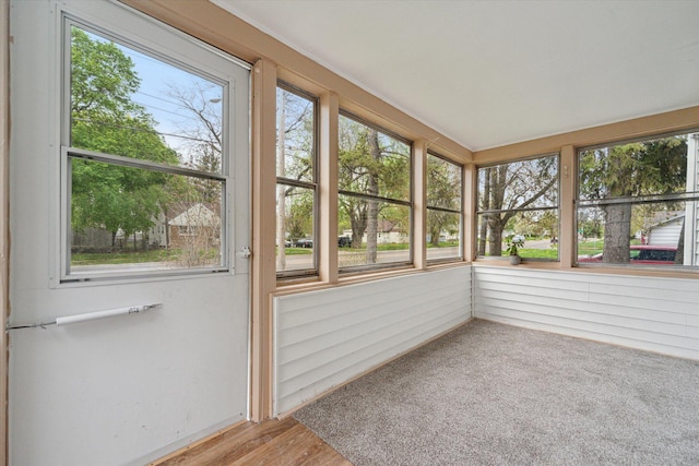 unfurnished sunroom with wood finished floors