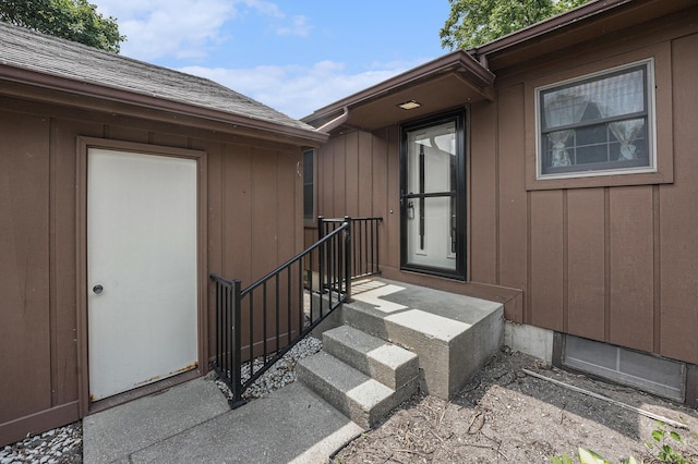 3217 Westminster Dr SE Unit 69, Grand Rapids, MI 49512 - entrance to property with board and batten siding and a shingled roof