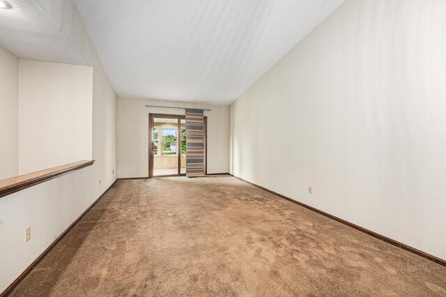 3217 Westminster Dr SE Unit 69, Grand Rapids, MI 49512 - carpeted empty room featuring baseboards
