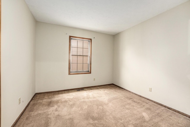 3217 Westminster Dr SE Unit 69, Grand Rapids, MI 49512 - carpeted empty room featuring baseboards