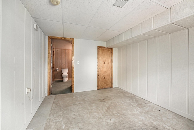3217 Westminster Dr SE Unit 69, Grand Rapids, MI 49512 - unfurnished bedroom with unfinished concrete flooring, a drop ceiling, and ensuite bath