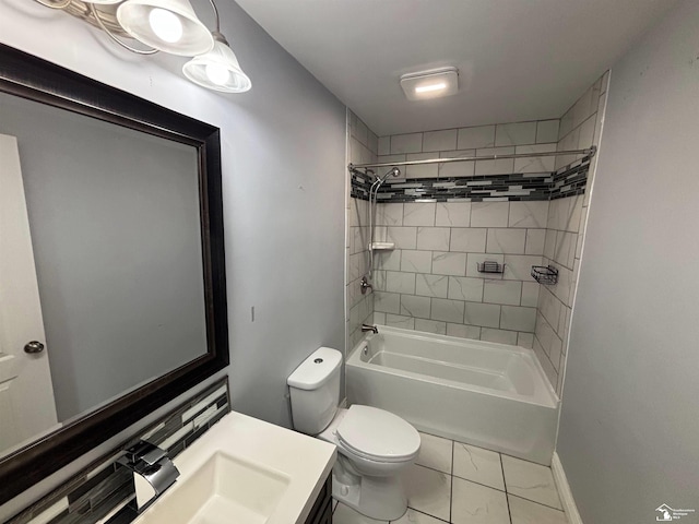 bathroom with marble finish flooring, toilet, vanity, washtub / shower combination, and baseboards