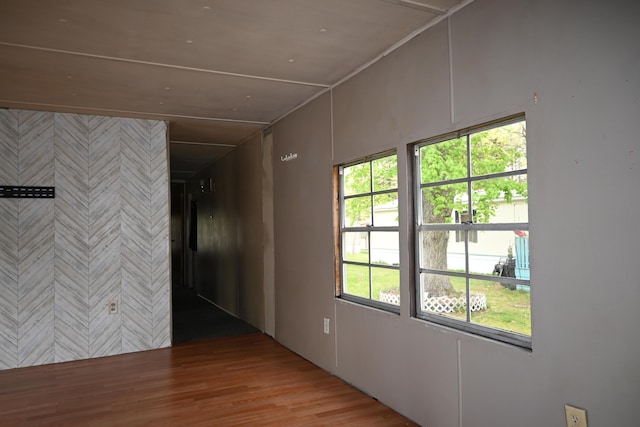 empty room with wood finished floors