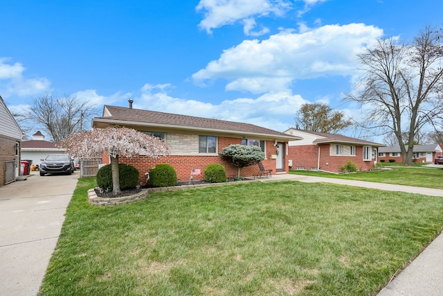 single story home with brick siding and a front lawn