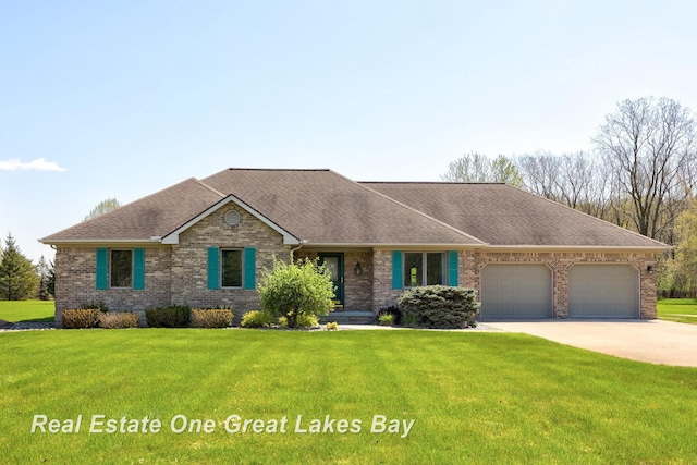 view of front of property with a garage, brick siding, concrete driveway, a front lawn, and a shingled roof