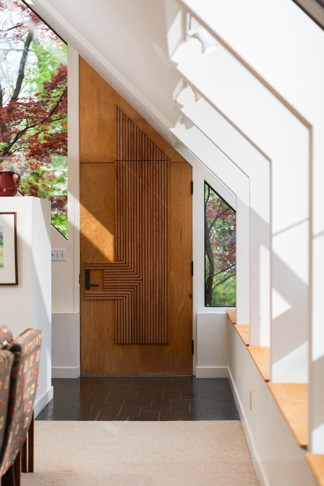 interior space featuring baseboards