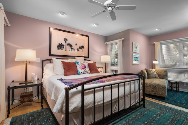 bedroom with multiple windows, ceiling fan, and recessed lighting