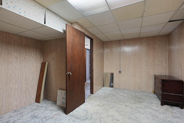 2394 Cedar Crest Dr NE, Grand Rapids, MI 49525 - finished below grade area with carpet, a drop ceiling, and wooden walls