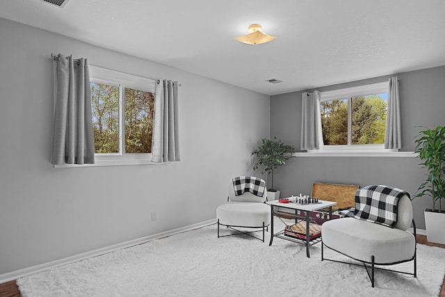 2394 Cedar Crest Dr NE, Grand Rapids, MI 49525 - living area featuring baseboards