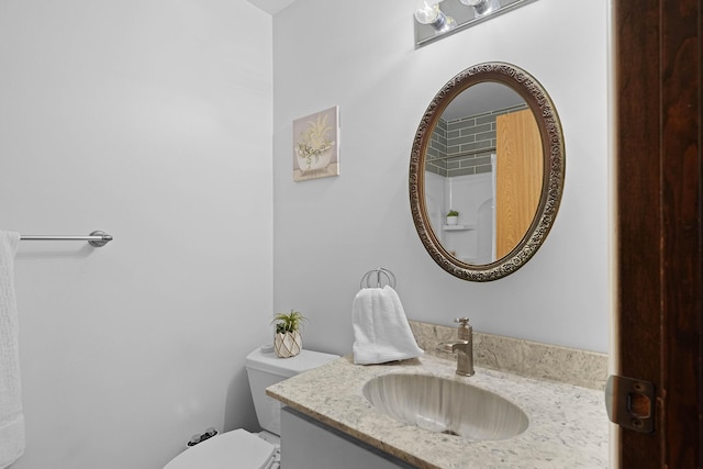2394 Cedar Crest Dr NE, Grand Rapids, MI 49525 - bathroom featuring vanity and toilet