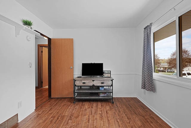 2394 Cedar Crest Dr NE, Grand Rapids, MI 49525 - bedroom featuring wood finished floors and baseboards