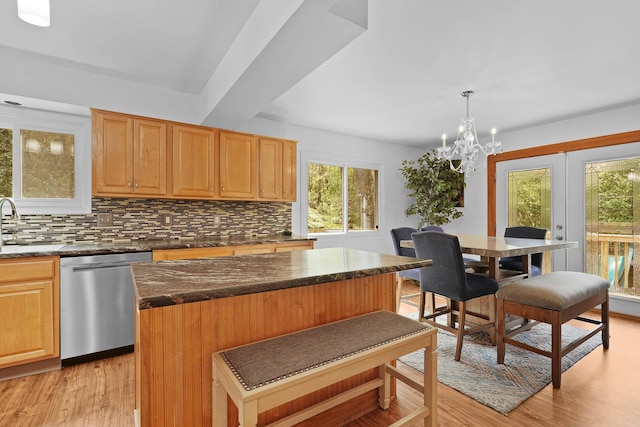 2394 Cedar Crest Dr NE, Grand Rapids, MI 49525 - kitchen featuring dishwasher, light wood-type flooring, and tasteful backsplash