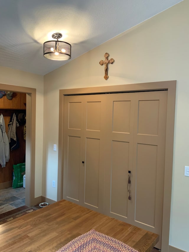 15205 Riverview Rd SE, Grayling, MI 49738 - foyer with wood finished floors and lofted ceiling