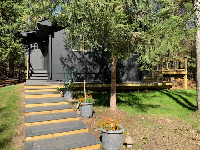 15205 Riverview Rd SE, Grayling, MI 49738 - view of grassy yard featuring a deck