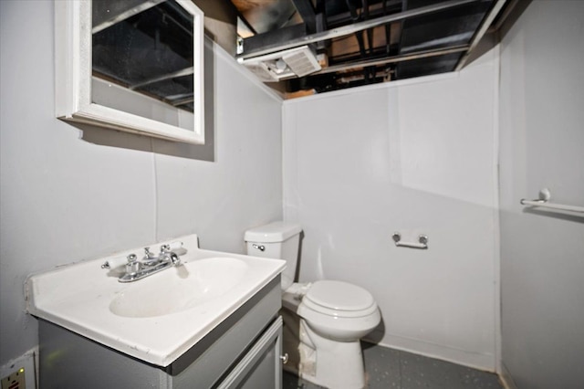 half bath with vanity and toilet