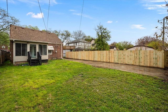 view of yard with entry steps