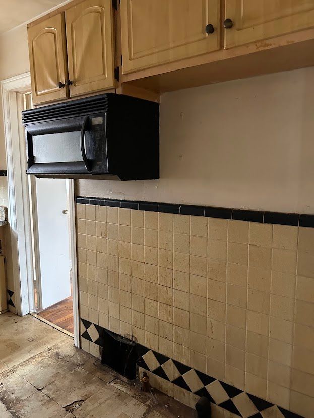 kitchen view of black microwave