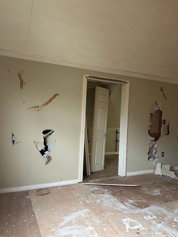 spare room featuring crown molding