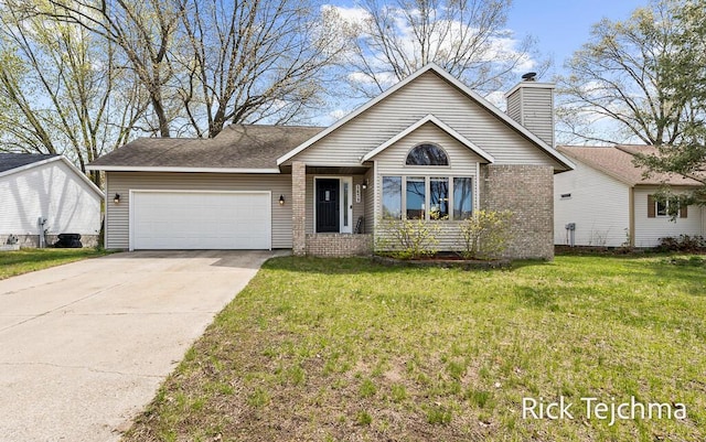 view of front of property featuring brick siding, a garage, a chimney, driveway, and a front yard