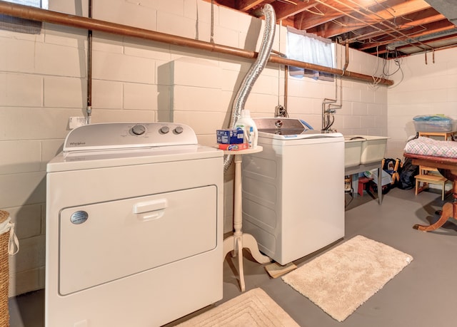 5200 N Jennings Rd, Flint, MI 48504 - washroom featuring independent washer and dryer and concrete block wall