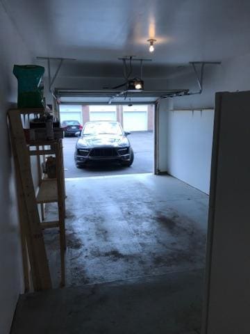 garage featuring a garage door opener